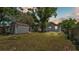Spacious backyard with shed, mature trees and a well maintained fence at 1105 Terry S Ave, Lakeland, FL 33815