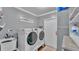 Bright laundry room with a large washer and dryer at 1105 Terry S Ave, Lakeland, FL 33815