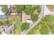 Aerial view of the property, highlighting its location and surrounding landscape with mature trees at 1205 Scottsland Dr, Lakeland, FL 33813