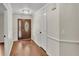 Home foyer featuring hardwood floors and craftsman style trim at 1205 Scottsland Dr, Lakeland, FL 33813