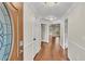 Home foyer with hardwood floors and craftsman style trim at 1205 Scottsland Dr, Lakeland, FL 33813