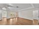 Bright and airy living room with large windows and hardwood floors at 1205 Scottsland Dr, Lakeland, FL 33813