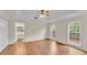 Spacious main bedroom with a trey ceiling, a ceiling fan, and natural light at 1205 Scottsland Dr, Lakeland, FL 33813