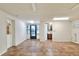 Spacious unfinished basement featuring a door to the backyard and an entrance to the bathroom at 1407 Easton Dr, Lakeland, FL 33803