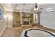 Inviting living room with a stone fireplace, hardwood floors, and a comfortable setting at 1407 Easton Dr, Lakeland, FL 33803