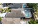 Aerial view of several homes with screened-in pools in a residential neighborhood at 1573 Avleigh Cir, Orlando, FL 32824
