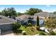 Attractive single-story home featuring manicured landscaping and an attached two-car garage at 1573 Avleigh Cir, Orlando, FL 32824