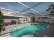 Enjoy this refreshing screened-in pool with plenty of room for lounge chairs at 1573 Avleigh Cir, Orlando, FL 32824