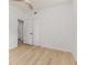 Bright bedroom with a ceiling fan, neutral walls, and wood-look floors at 1604 Sylvester Rd, Lakeland, FL 33803