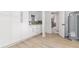 Bright laundry room with built in cabinets and counter space at 1604 Sylvester Rd, Lakeland, FL 33803