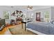 Spacious bedroom featuring hardwood floors and ceiling fan at 1760 Old Bartow Eagle Lake Rd, Bartow, FL 33830