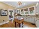 Bright kitchen with hardwood floors, an island, and granite countertops at 1760 Old Bartow Eagle Lake Rd, Bartow, FL 33830