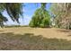 Huge grassy area with mature trees creating a blank canvas for your own personalized escape at 1760 Old Bartow Eagle Lake Rd, Bartow, FL 33830