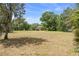 Expansive land with mature trees, offering endless opportunities to build a dream home at 1760 Old Bartow Eagle Lake Rd, Bartow, FL 33830