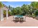 Outdoor dining by the pool at 1760 Old Bartow Eagle Lake Rd, Bartow, FL 33830