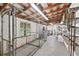 Large utility room featuring cages and storage, ideal for various household needs at 1760 Old Bartow Eagle Lake Rd, Bartow, FL 33830