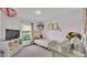 Charming ' bedroom with a cozy bed and whimsical decor at 185 Heritage Park Ln, Mulberry, FL 33860