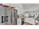 Stylish kitchen featuring stainless steel appliances, bright countertops, and an eat-in area at 185 Heritage Park Ln, Mulberry, FL 33860