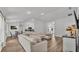 Spacious living room with modern design and hardwood floors throughout the space at 185 Heritage Park Ln, Mulberry, FL 33860