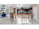 Well-appointed kitchen featuring a granite-topped island with seating and modern appliances, great for entertaining guests at 1925 Binnacle St, Kissimmee, FL 34744