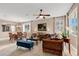 Inviting living area with tile flooring, comfortable seating, and large windows providing natural light, ideal for relaxation at 1925 Binnacle St, Kissimmee, FL 34744