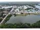 Breathtaking aerial view of a serene waterfront community featuring tranquil lakes and lush green spaces at 2055 S Floral Ave # 269, Bartow, FL 33830