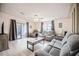 Spacious living room with comfortable furniture and sliding glass doors at 2055 S Floral Ave # 269, Bartow, FL 33830