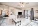 Open concept living room with ceiling fan and sliding glass door at 2055 S Floral Ave # 269, Bartow, FL 33830