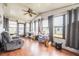Bright sunroom featuring a ceiling fan, and lots of natural light from the many windows at 2055 S Floral Ave # 269, Bartow, FL 33830