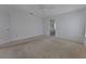 Spacious bedroom with neutral carpet and light walls offers a tranquil atmosphere at 2085 Long Boat Dr, Lakeland, FL 33810