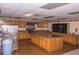 Large kitchen with stainless appliances, central island, and ample cabinet space at 2085 Long Boat Dr, Lakeland, FL 33810