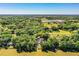 Expansive property featuring a home, surrounded by lush greenery, showcasing its secluded location at 2319 D R Bryant Rd, Lakeland, FL 33810