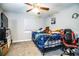 Bright bedroom with ceiling fan, comfortable bed, and a cozy atmosphere for relaxation and rest at 2319 D R Bryant Rd, Lakeland, FL 33810
