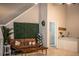 Cozy seating area with green accent wall and sofa at 2319 D R Bryant Rd, Lakeland, FL 33810