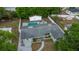 Bird's eye view featuring a fenced yard with a pool, a cozy pool house, and the home's roofline at 2332 S Crystal Lake Dr, Lakeland, FL 33801