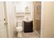 Bright bathroom featuring tiled walls, modern vanity, and glass shower enclosure at 2332 S Crystal Lake Dr, Lakeland, FL 33801