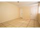 Neutral bedroom with tile floors and clean, bright walls at 2332 S Crystal Lake Dr, Lakeland, FL 33801