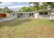 Charming single-story home with a well-maintained lawn and inviting curb appeal at 2332 S Crystal Lake Dr, Lakeland, FL 33801