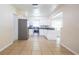 Spacious kitchen area with modern stainless steel appliances and tiled floors at 2332 S Crystal Lake Dr, Lakeland, FL 33801