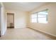 Bright living room offers lots of natural light and a double closet at 2332 S Crystal Lake Dr, Lakeland, FL 33801