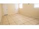 Bright living room featuring neutral toned walls and white door at 2332 S Crystal Lake Dr, Lakeland, FL 33801