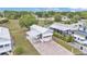 Aerial view showcasing the home's layout, carport, and proximity to other residences at 2511 Limewood Ave, Clermont, FL 34714