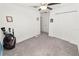 Comfortable bedroom with neutral carpet, ceiling fan, and closet creating a functional and inviting space at 2726 Red Egret Dr, Bartow, FL 33830