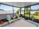 Inviting screened-in patio featuring comfortable seating and picturesque backyard views at 2726 Red Egret Dr, Bartow, FL 33830