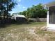 Large backyard featuring a fence and shed at 281 Glenridge S Loop, Lakeland, FL 33809