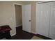 Bedroom featuring an open doorway and closet providing extra storage space at 281 Glenridge S Loop, Lakeland, FL 33809