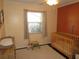 Bright Bedroom with crib, changing table and toys at 281 Glenridge S Loop, Lakeland, FL 33809