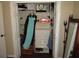 Walk-in closet with dress and accessories and shelves for storage at 281 Glenridge S Loop, Lakeland, FL 33809