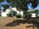 Charming single-story home with a tidy yard and mature landscaping at 281 Glenridge S Loop, Lakeland, FL 33809