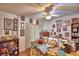 Cozy bedroom with a lot of wall decorations and a bookshelf at 2836 Magnolia Ave, Lakeland, FL 33812